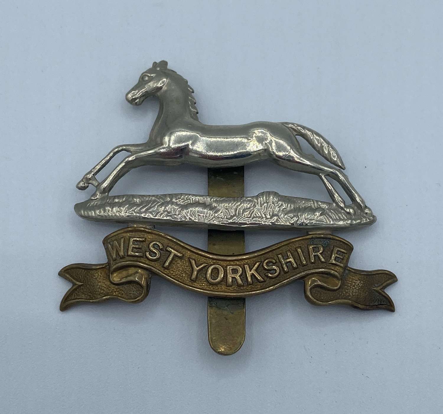 WW2 West Yorkshire Slider Cap Badge