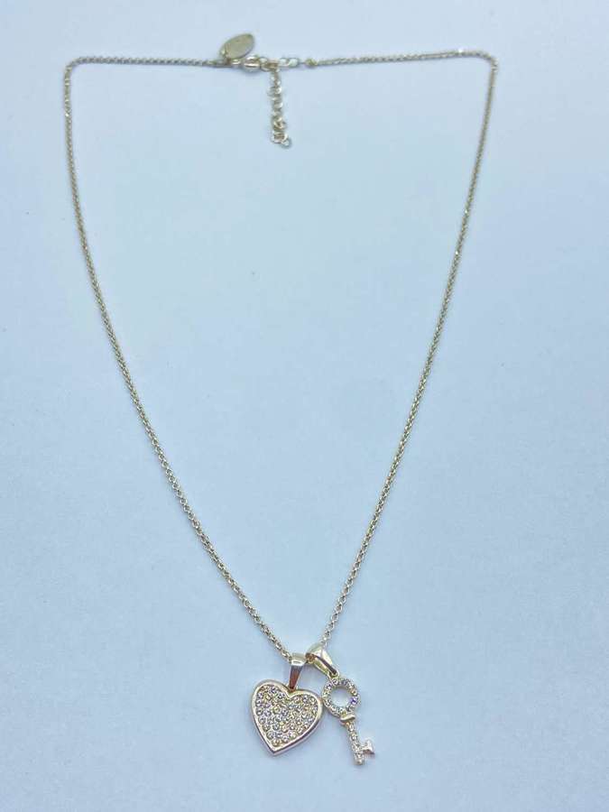 Beautiful Sterling Silver & Cubic Zirconia Heart And Key Necklace