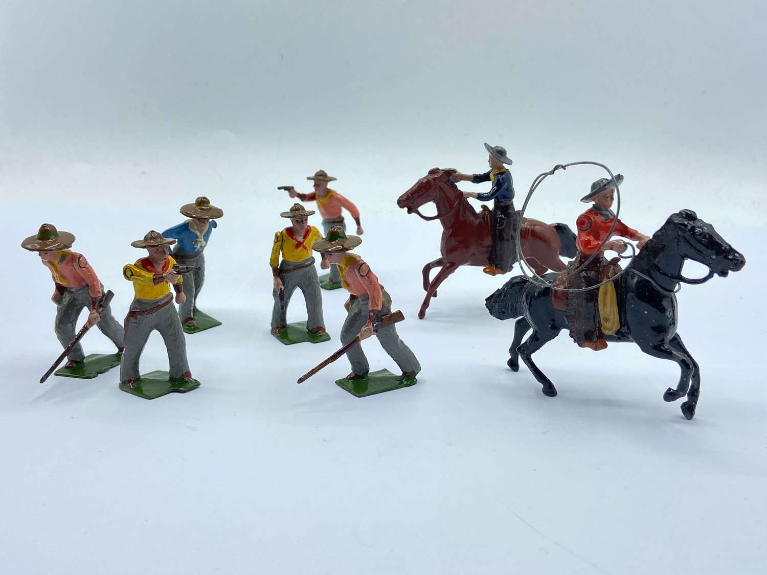 Vintage Hand Painted Lead Cowboys With Moving Arms By Britains Ltd